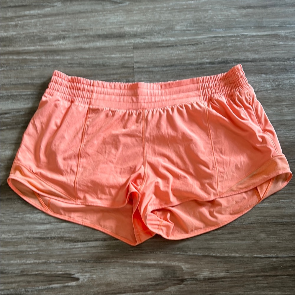 Lululemon Orange Hotty Hot High Rise 2.5” shirts